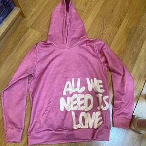 Pink Hoodie with 'All We Need Is Love' Print